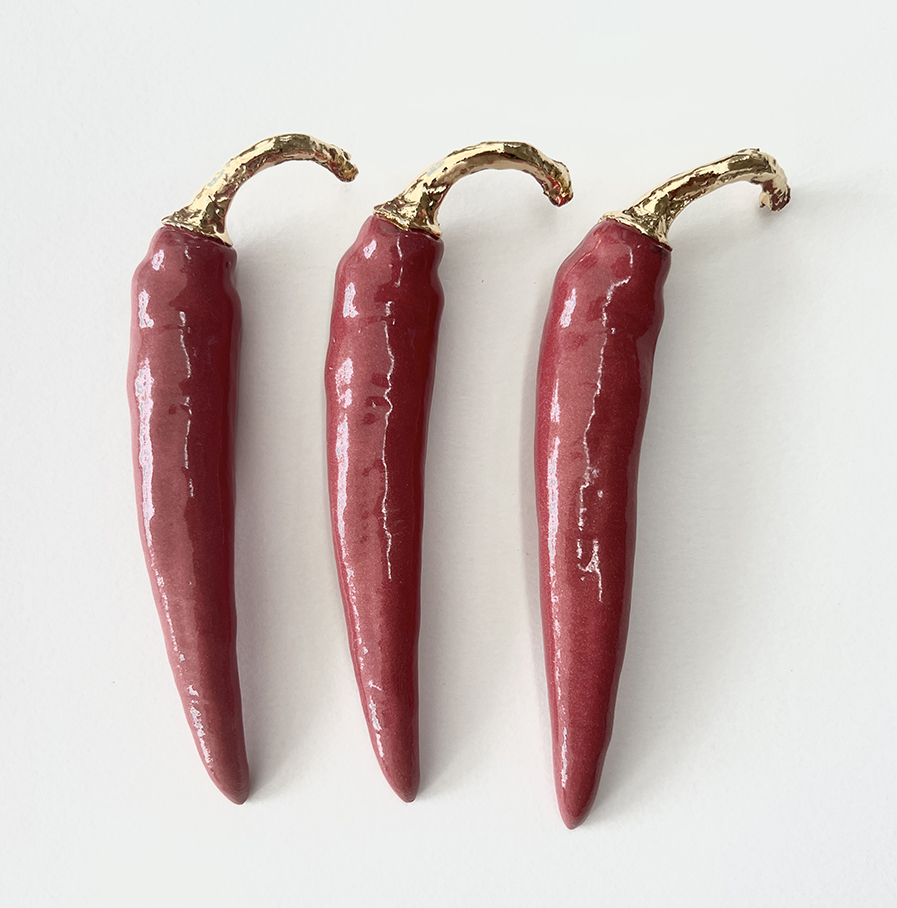 Sibrich Veenland - chilipeper rood met gouden steeltje