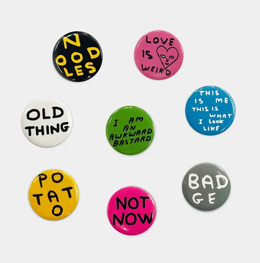 Set van 8 David Shrigley buttons met verschillende ontwerpen