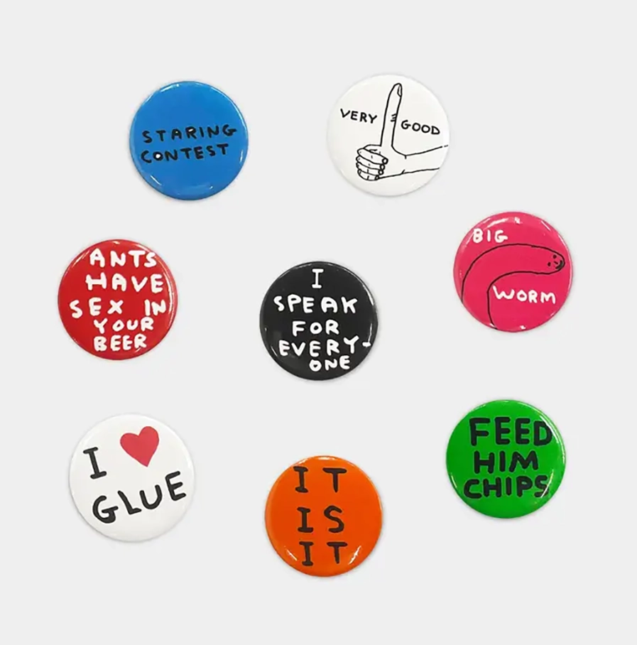 Set van 8 David Shrigley buttons met verschillende ontwerpen