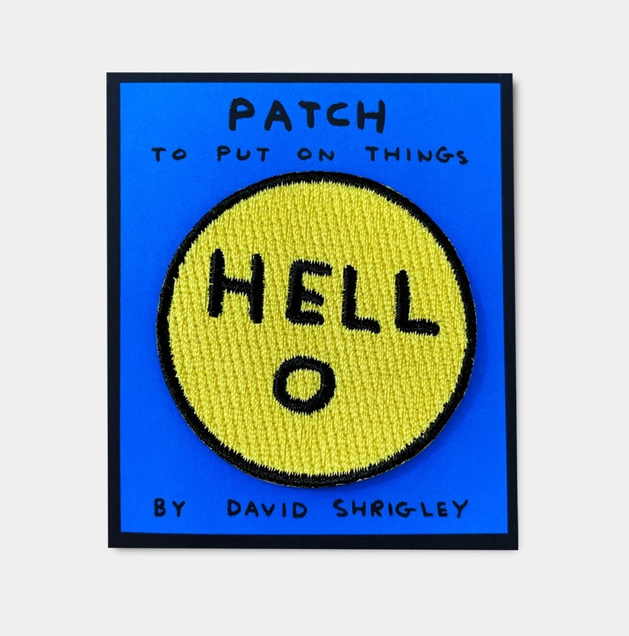Gele David Shrigley strijkpatch met de tekst Hello