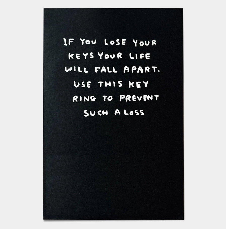 David Shrigley sleutelhanger met de tekst I want to look like this